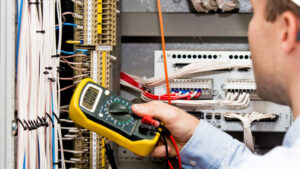 Engineer checking power supply